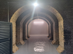 An empty arch with white lining