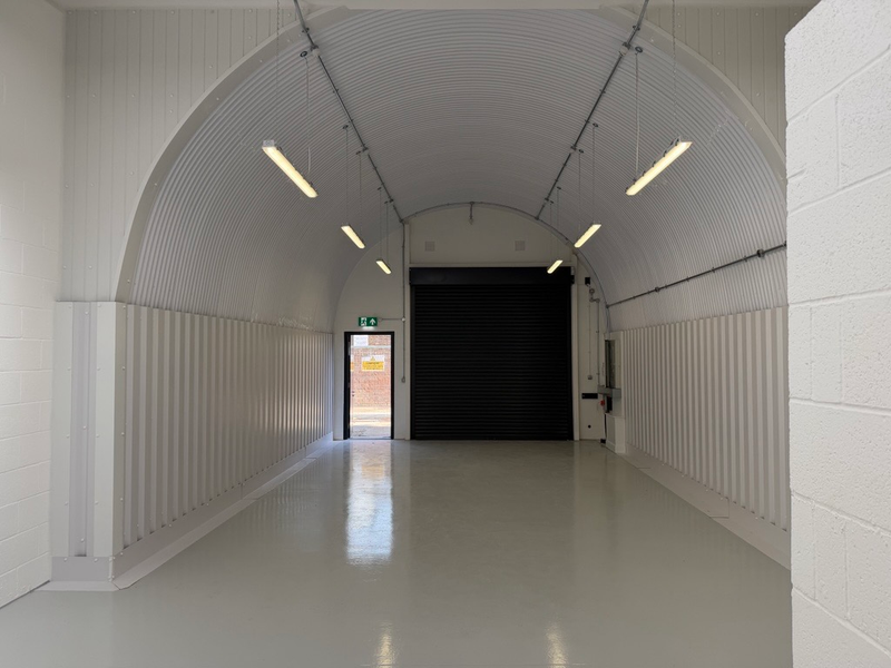 An empty arch with white lining