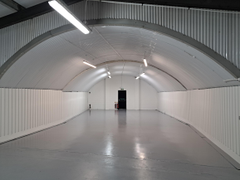 An empty arch with white lining