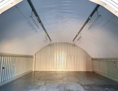 An empty arch with white lining