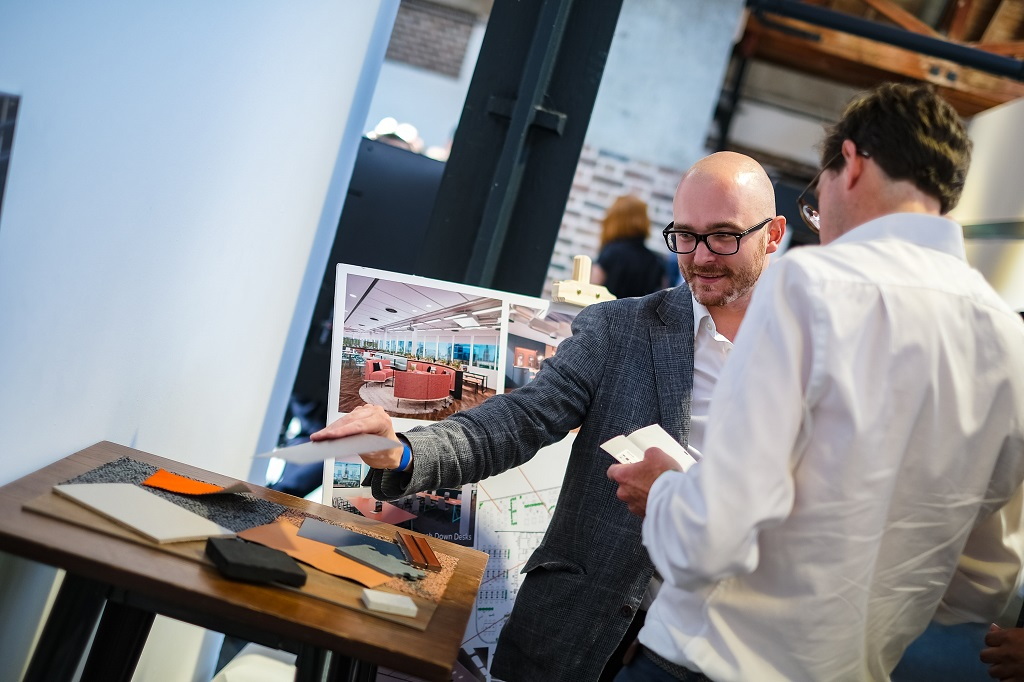 Careers Hub employee talking to his colleague