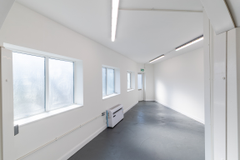 The interior of a warehouse unit, facing the back.