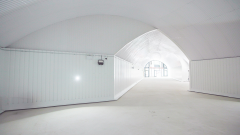 An empty arch with white lining