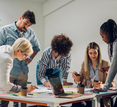 Group of people discussing the transportation plan for a product launch