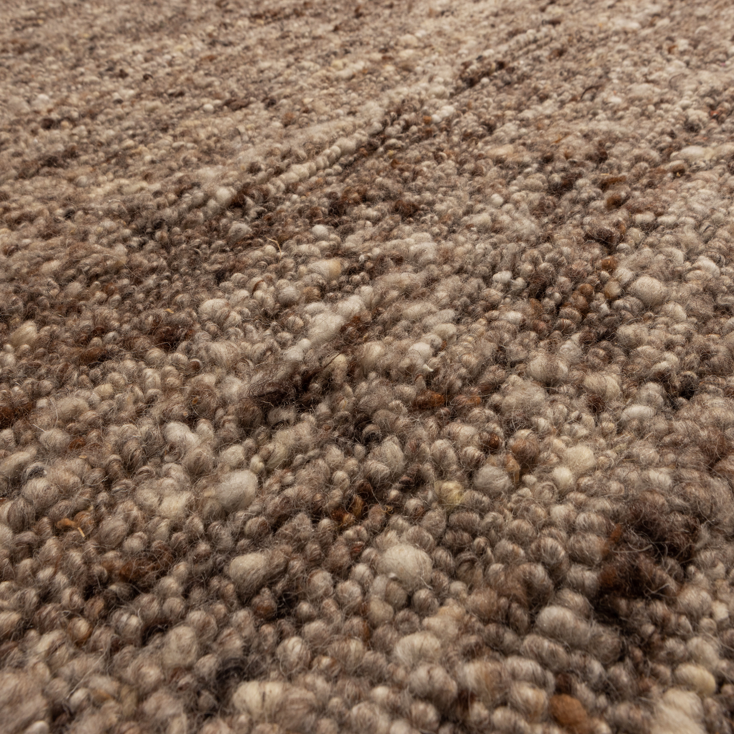 375050-B-01_VS_WE_Efia_vloerkleed_rond_wol_bruin_melange_O200cm_detail.png?auto=webp&format=png&width=1500&height=1500