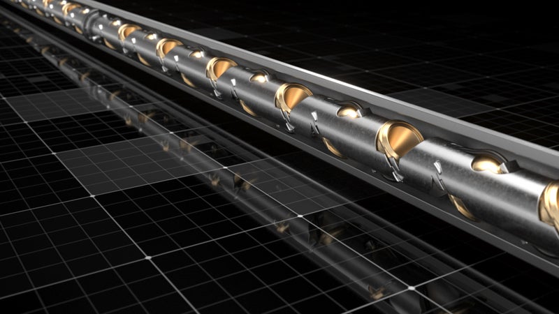 Inclined gun system reduces sand in deviated wells