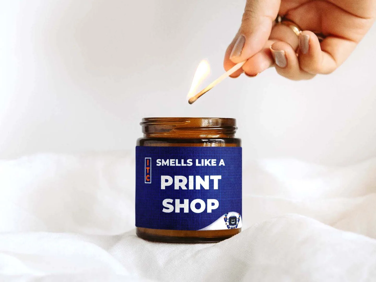 Custom pressure-sensitive label applied to an amber glass jar