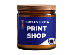 Custom pressure-sensitive label applied to an amber glass jar