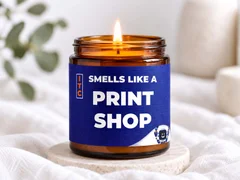 Custom pressure-sensitive label applied to an amber glass jar