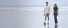 man and woman walking in vuori clothing