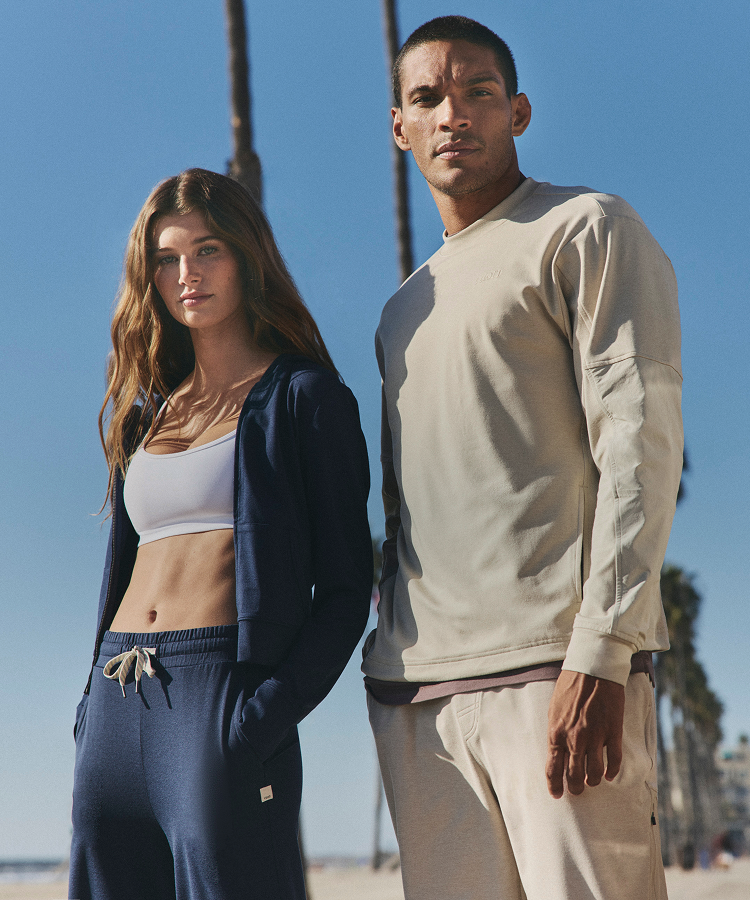 man and woman in vuori clothing