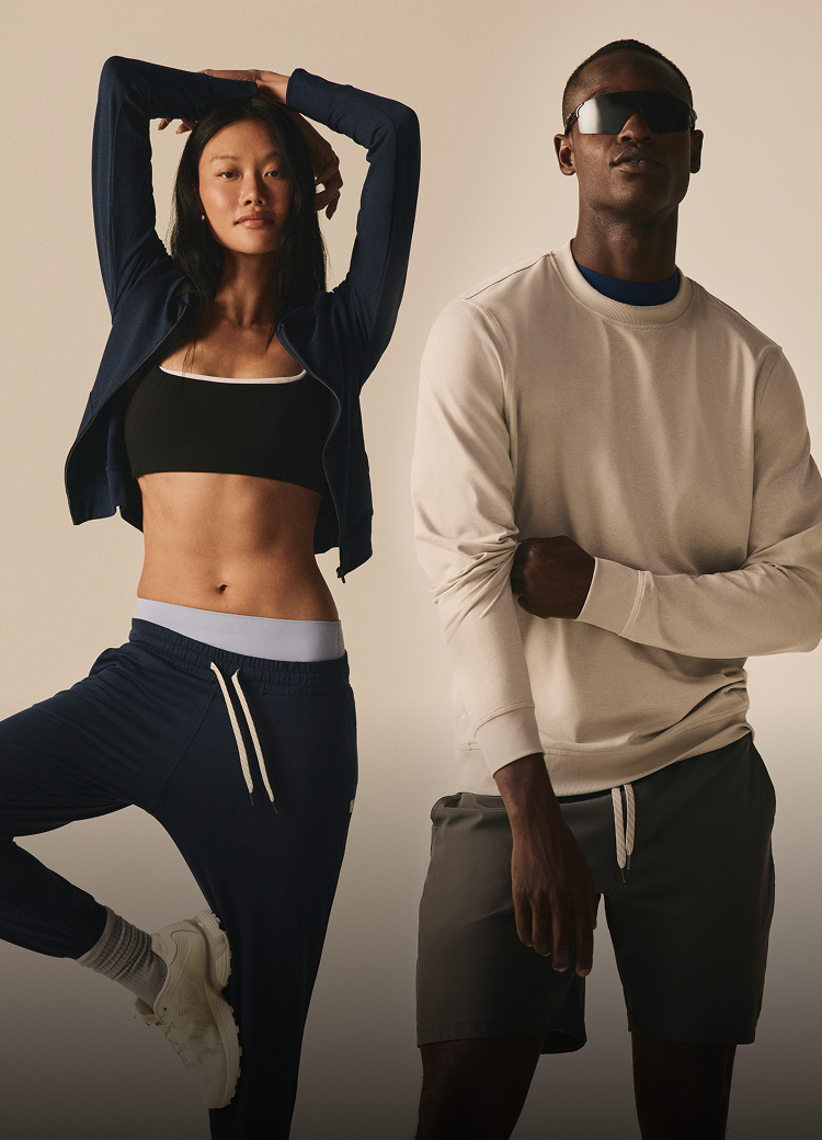 man and woman wearing vuori clothing