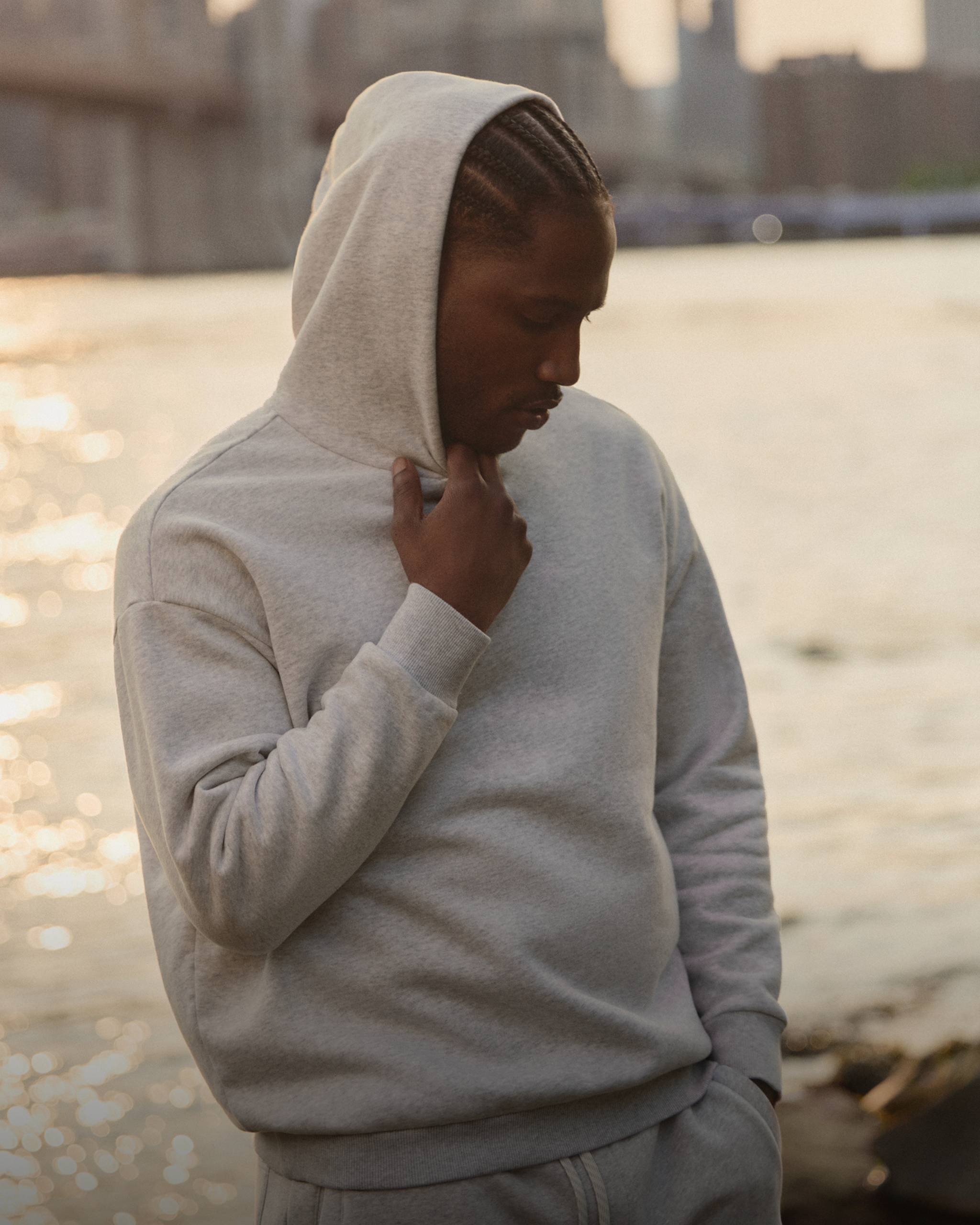 man wearing vuori restore hoodie