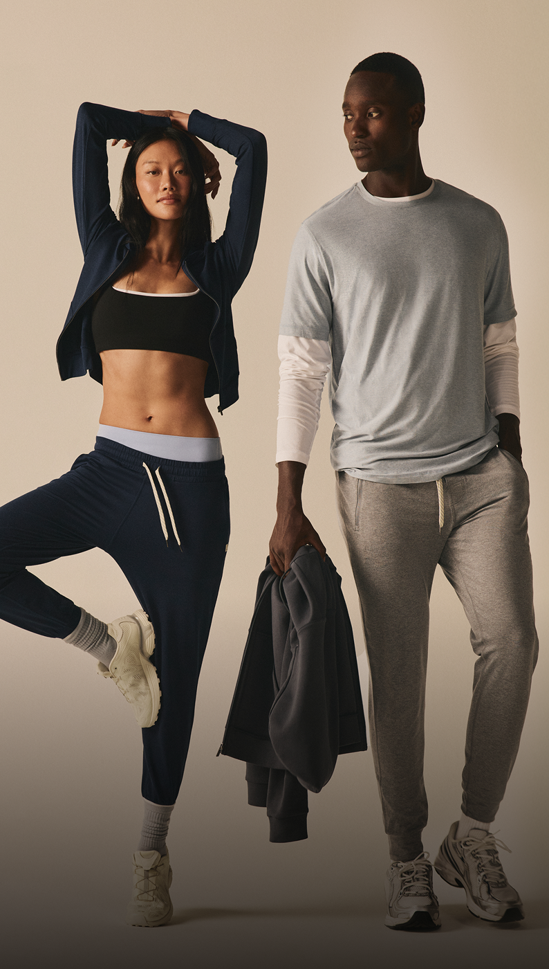 man and woman wearing vuori clothing