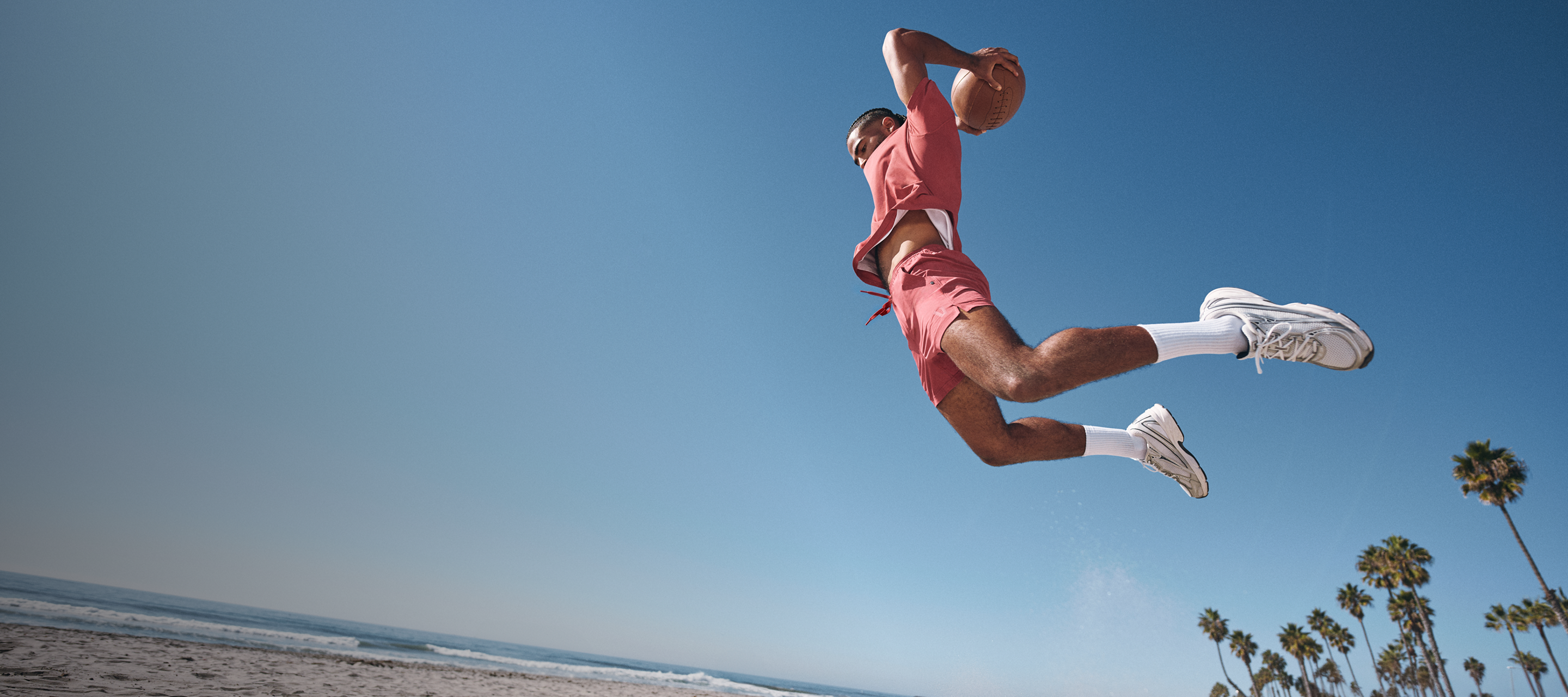 man wearing the vuori hardkore short in fire