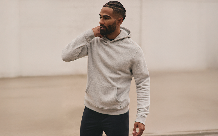 man in seaside hoodie