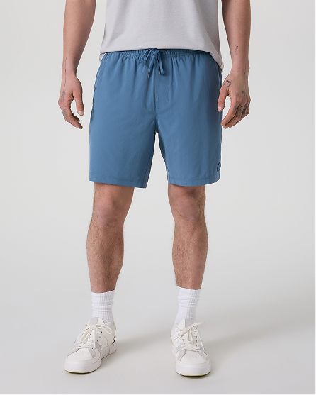 man wearing kore short in pool blue tonal