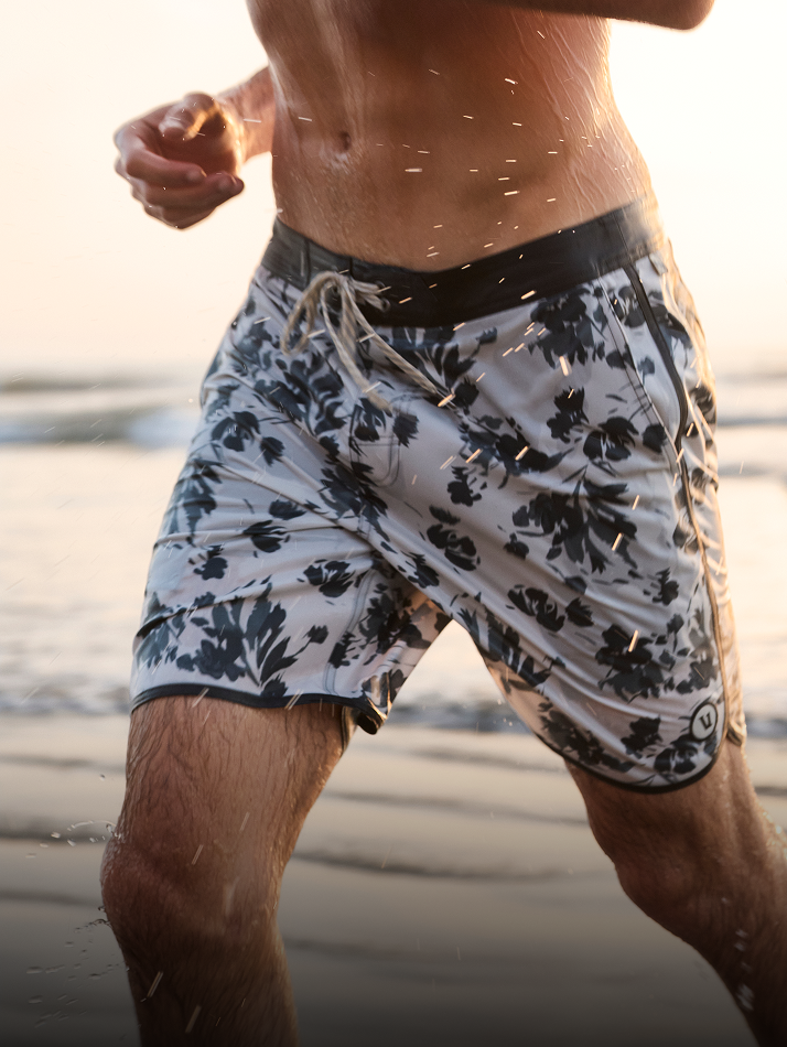 man wearing vuori boardshort