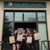 women with vuori bags outside of full ride cycling