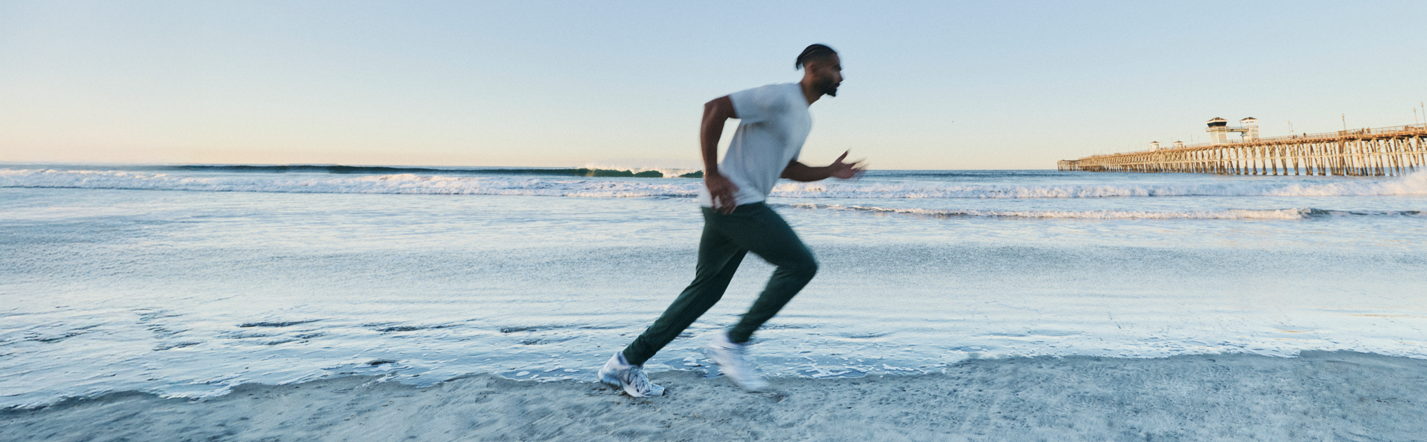 man running on the beach