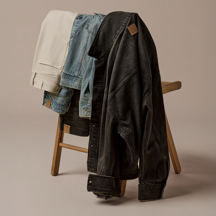 vuori denim laid over a bench