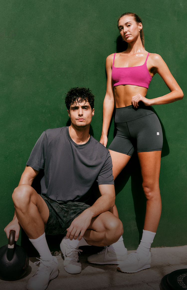 man and woman wearing vuori clothing
