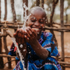 child in africa with clean water