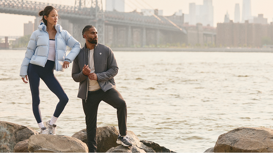 man and woman wearing vuori reset edit layers