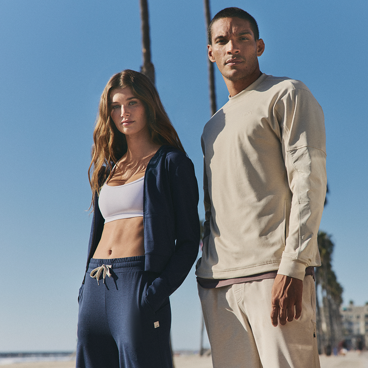 man and woman in vuori clothing