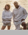 man and woman wearing vuori in grey