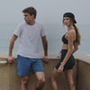man and woman running up hill