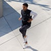 man wearing echo insulated vest