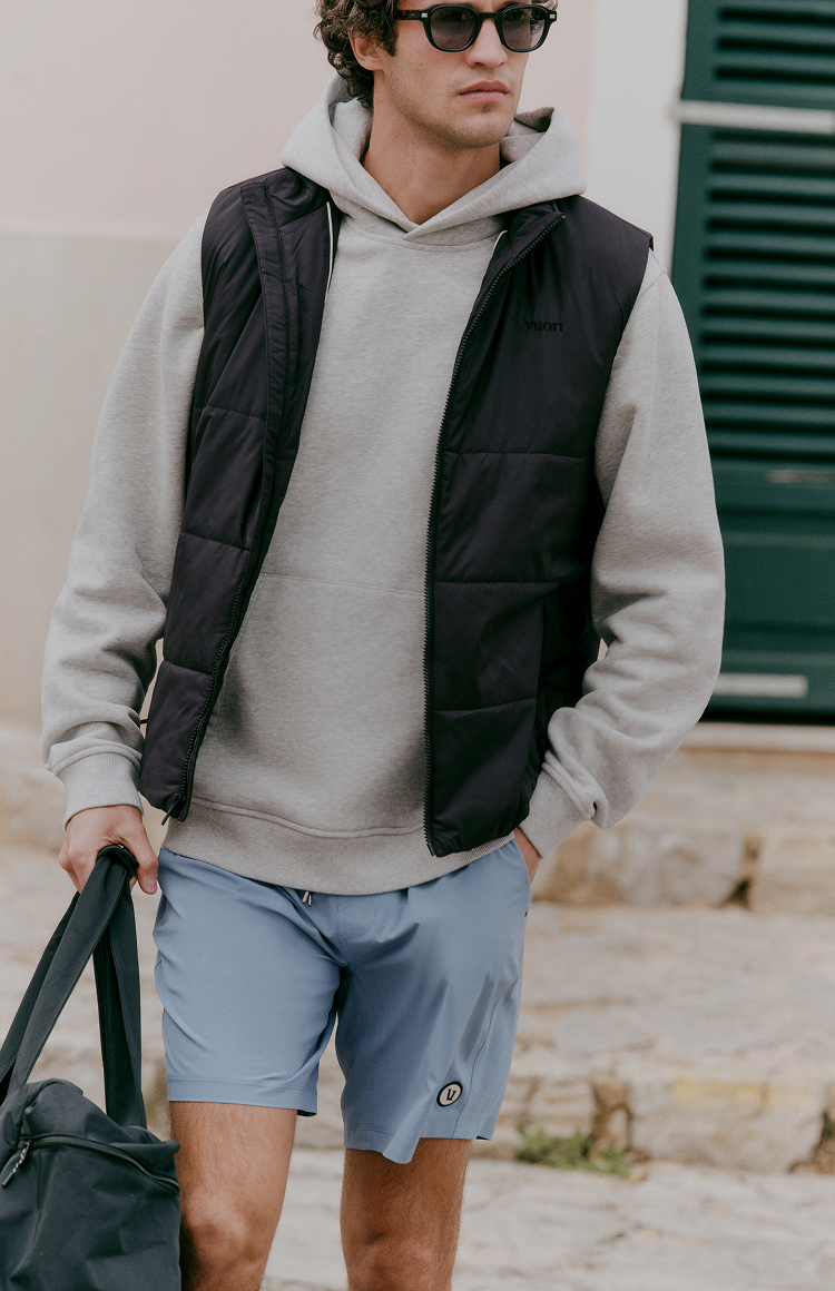 woman wearing vuori waffleknit sweater and jeans