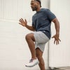 man working out in the trail short
