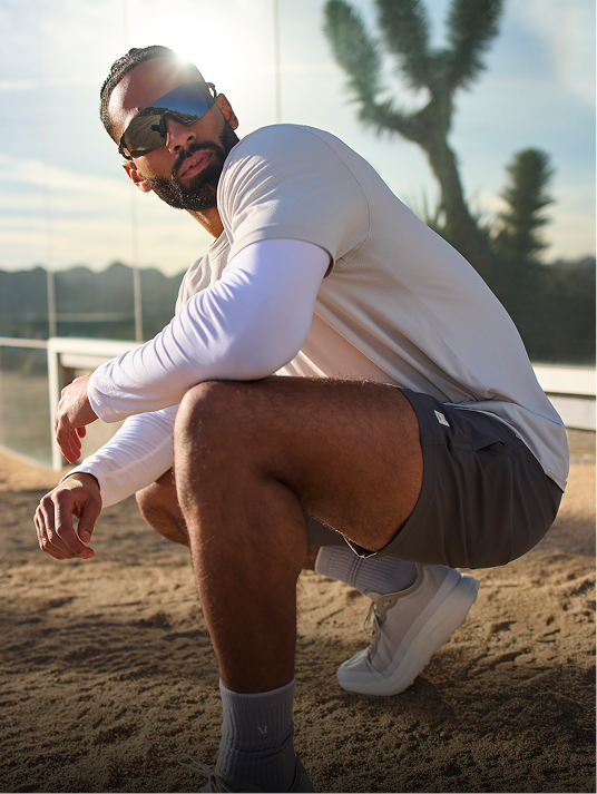 man wearing vuori long sleeve tee