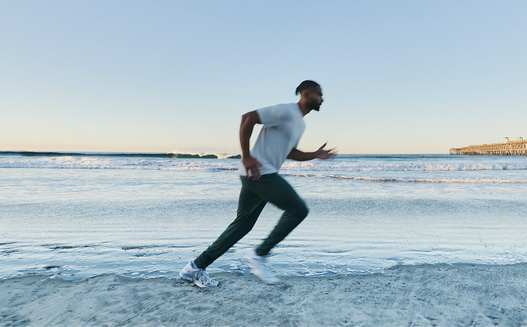 man running on the beach