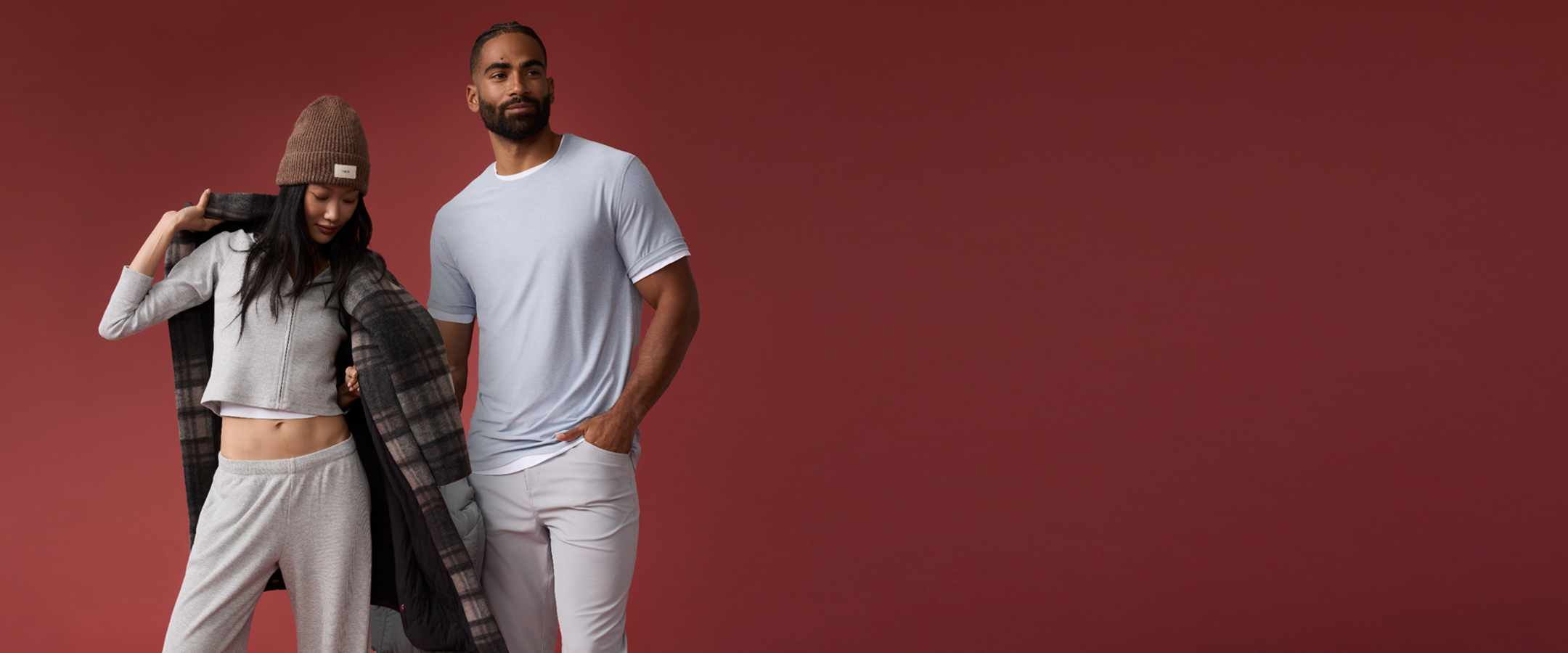 man and woman in vuori clothing