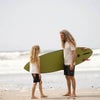 Rob Machado and son on beach