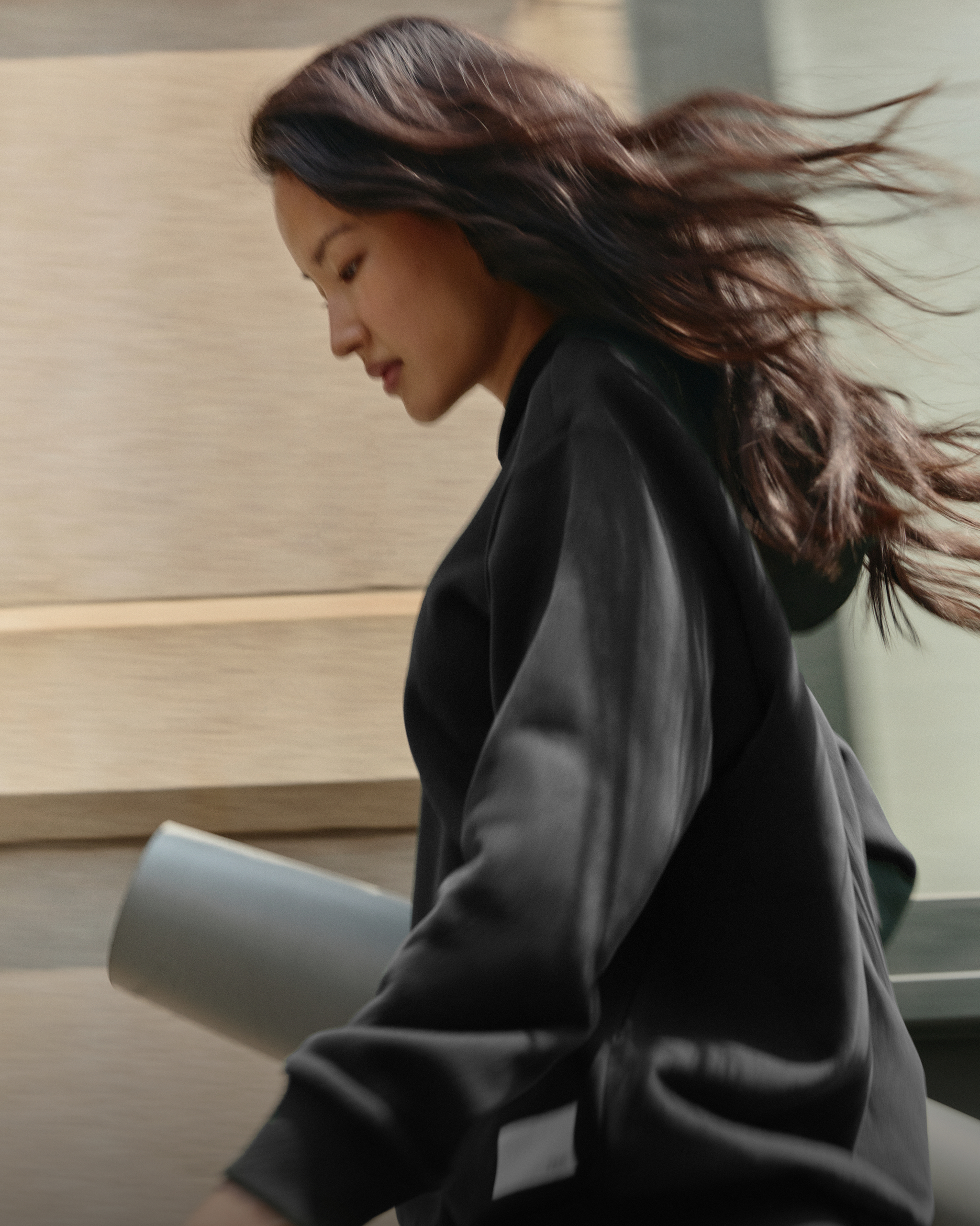 woman with a vuori yoga mat