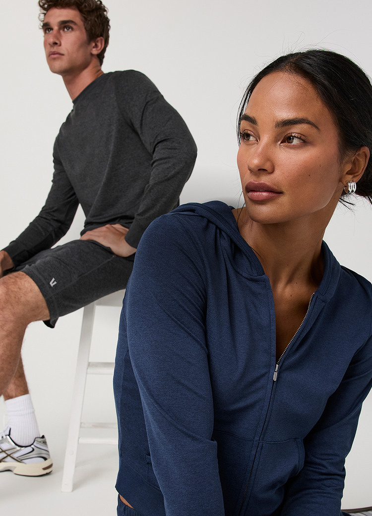 man and woman wearing vuori dreamknit