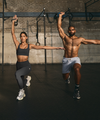 man and woman working out in vuori clothing