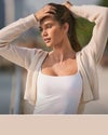 woman wearing vuori in warm neutral color