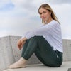woman wearing performance jogger and halo essential hoodie