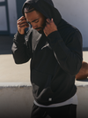 man wearing vuori seaside hoodie