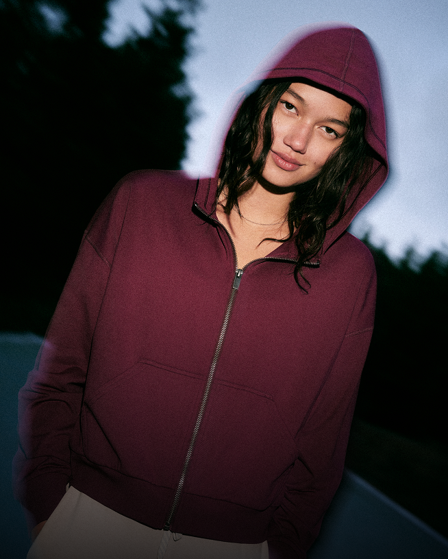 woman wearing vuori hoodie
