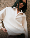 woman wearing vuori sweater