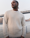 man wearing vuori sweater