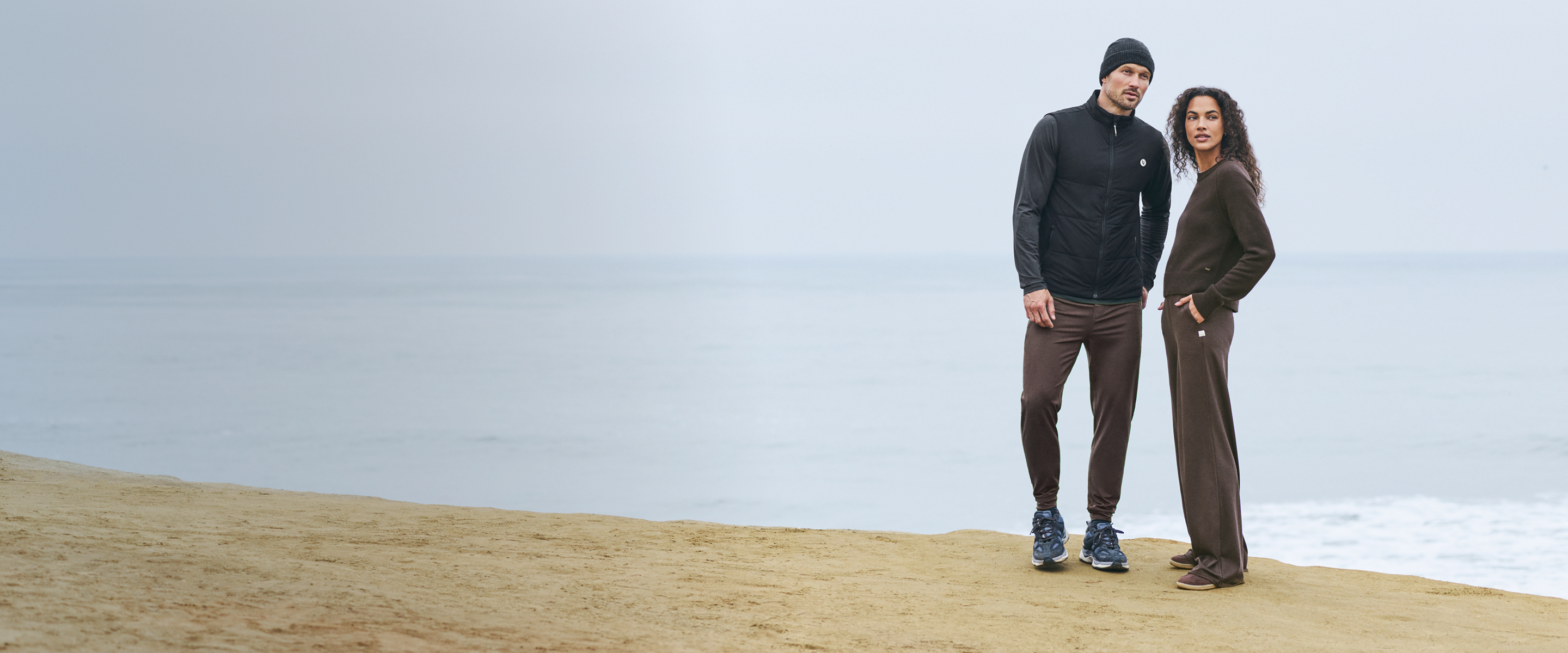 man and woman in vuori clothing