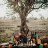 group of people in africa receiving clean water