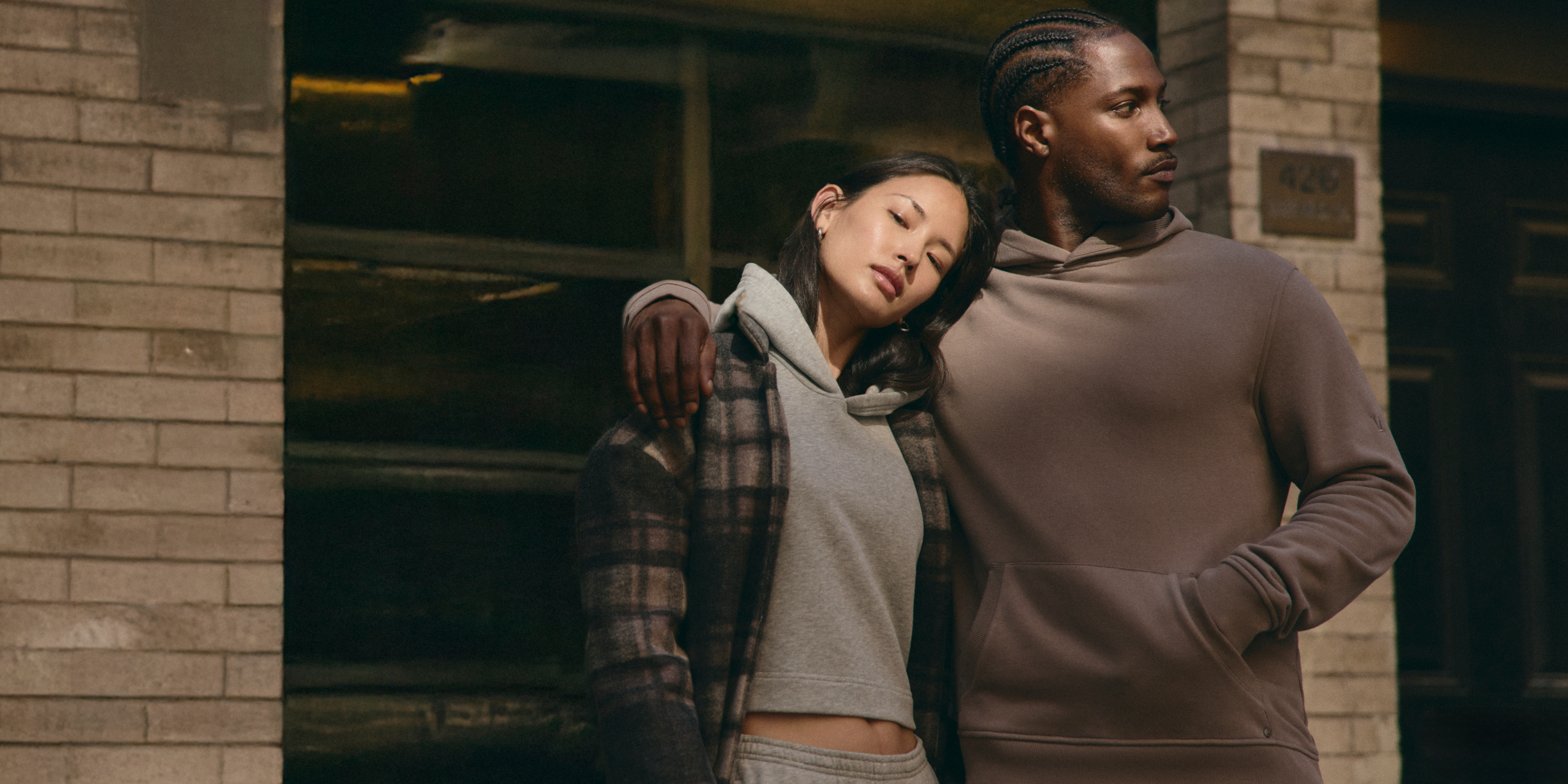 man and woman in vuori clothing